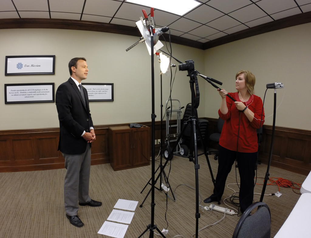 Making a video doesn't require a lot of equipment or a production crew. Here's a behind-the-scenes look at what our normal setup looks like. Pictured: Me (Left) and Heather Keeton (right). Heather is our executive producer. Her real job: Vice President & Human Resources Director