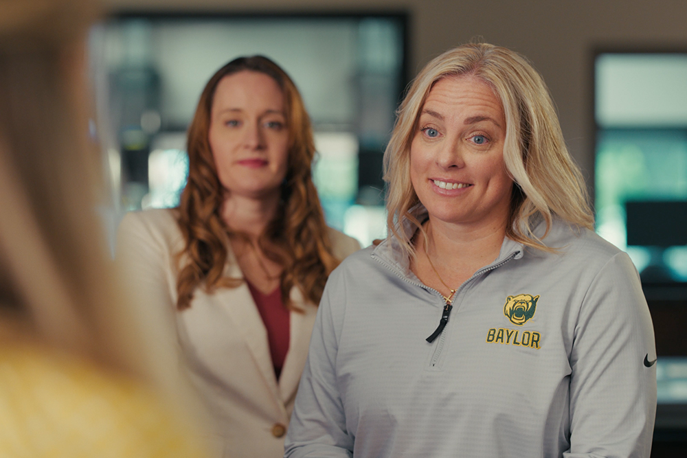 Nicki Collen smiles in Central National Bank's "Fast Break" Commercial